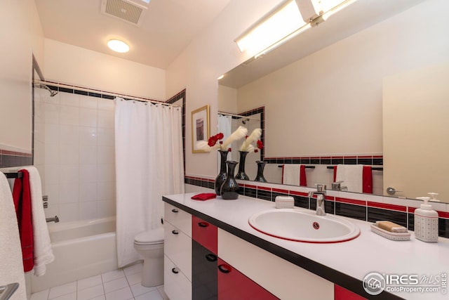 bathroom with shower / tub combo, visible vents, toilet, tile patterned floors, and vanity