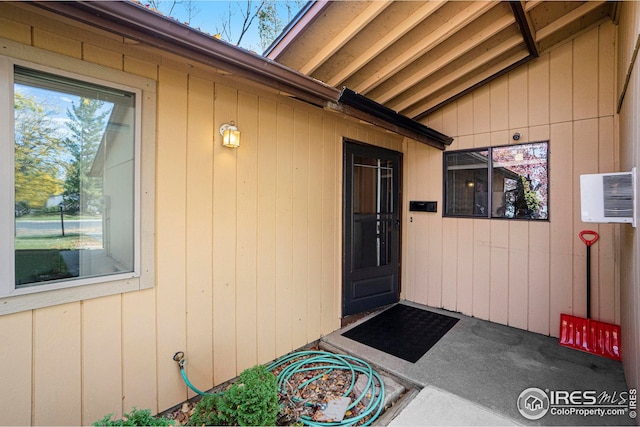 doorway to property with a patio area