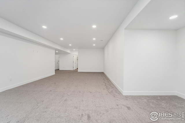 finished basement with recessed lighting, baseboards, and carpet