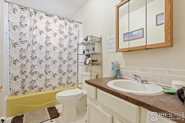 full bathroom with shower / bath combo, toilet, decorative backsplash, and vanity