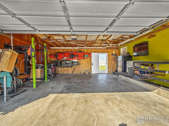 garage featuring a garage door opener