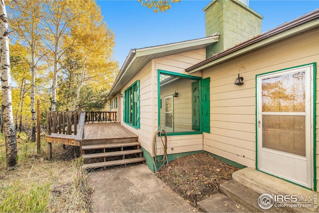 view of home's exterior with a deck