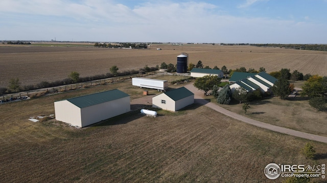 birds eye view of property featuring a rural view