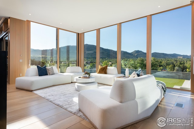 sunroom with a mountain view