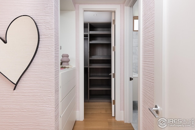 hallway featuring light wood-type flooring