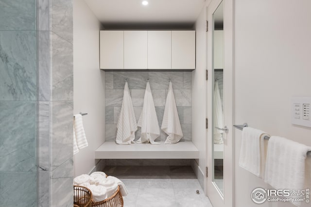 bathroom with tile patterned flooring