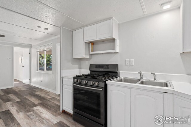 interior space featuring wooden walls, ceiling fan, dark hardwood / wood-style floors, white fridge, and crown molding