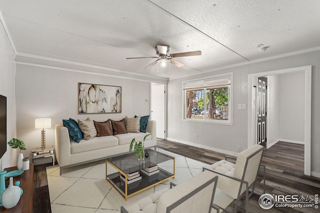 empty room featuring ornamental molding, ceiling fan, dark hardwood / wood-style floors, and a textured ceiling