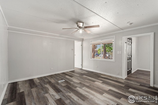 unfurnished living room featuring ornamental molding, light hardwood / wood-style flooring, a textured ceiling, and ceiling fan