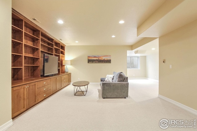 living room featuring light carpet