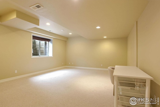 basement with carpet flooring