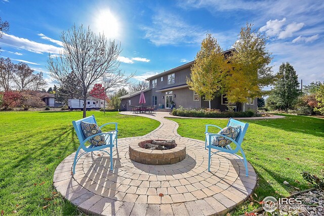 view of patio featuring a fire pit