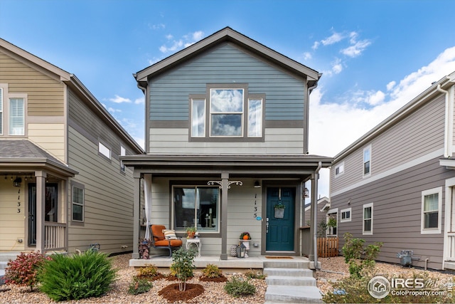 1135 Hummingbird Cir, Longmont, CO 80501 - view of front facade featuring covered porch