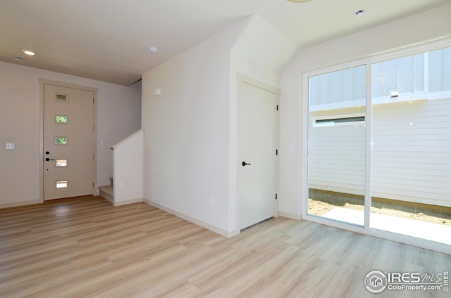 entrance foyer with light wood-type flooring