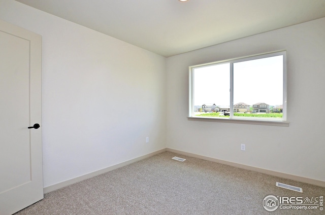 view of carpeted spare room