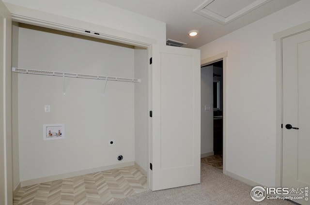 clothes washing area with hookup for a washing machine and electric dryer hookup