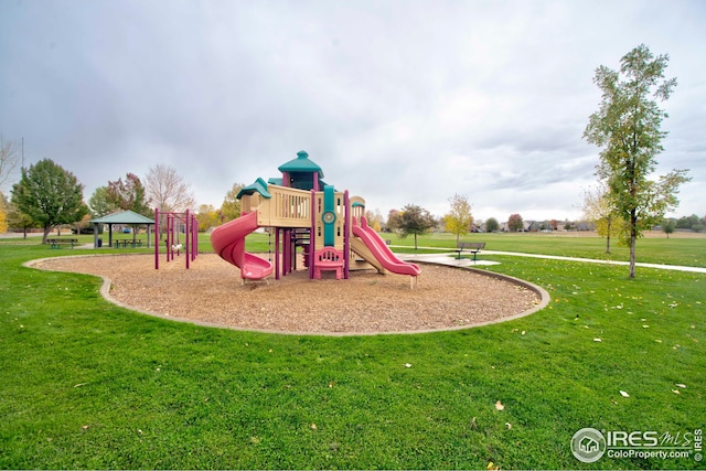 view of play area featuring a lawn