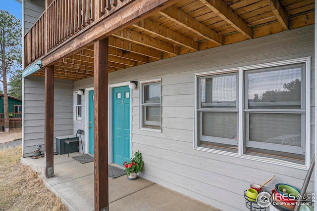 doorway to property featuring a patio