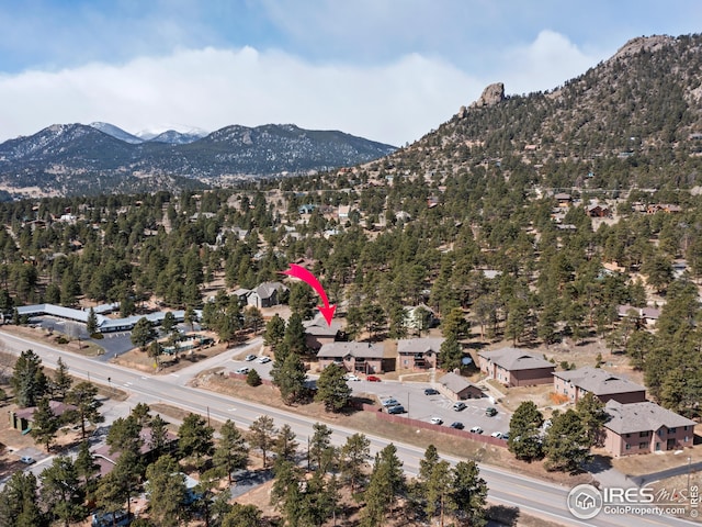 drone / aerial view featuring a mountain view