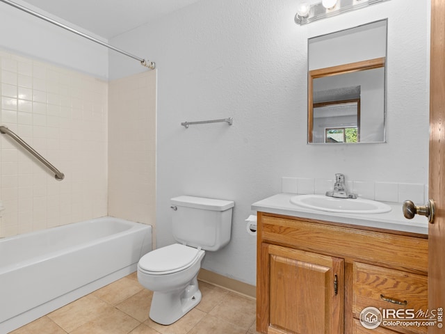 full bathroom featuring tile patterned floors, vanity,  shower combination, and toilet