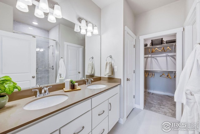 968 Birdwhistle Ln Unit 4, Fort Collins, CO 80524 - full bathroom with a walk in closet, a stall shower, double vanity, and a sink