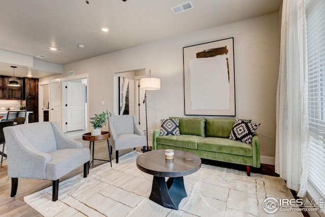 968 Birdwhistle Ln Unit 3, Fort Collins, CO 80524 - living room with baseboards, visible vents, light wood finished floors, and recessed lighting