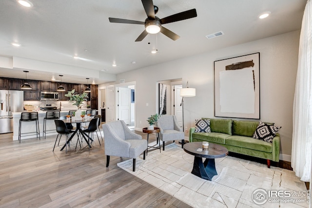 968 Birdwhistle Ln Unit 3, Fort Collins, CO 80524 - living area featuring visible vents, ceiling fan, light wood-style floors, baseboards, and recessed lighting