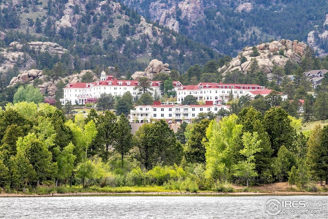 property view of mountains featuring a water view