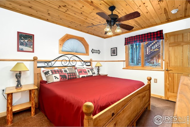 carpeted bedroom featuring wood ceiling and ceiling fan