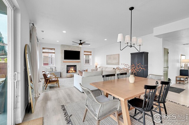 dining space featuring sink and light hardwood / wood-style floors