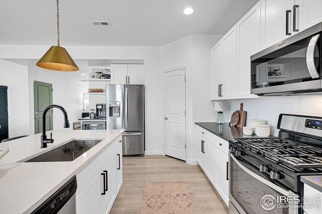 dining space featuring light hardwood / wood-style flooring