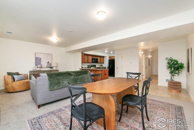 dining room featuring baseboards and visible vents