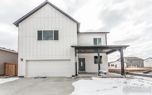 modern inspired farmhouse featuring a garage