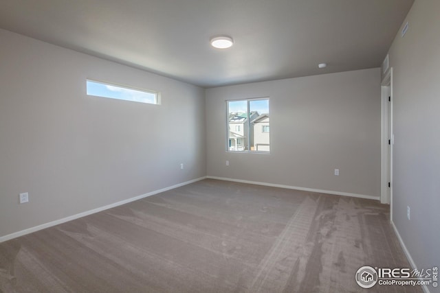 view of carpeted spare room