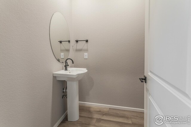 bathroom featuring hardwood / wood-style floors