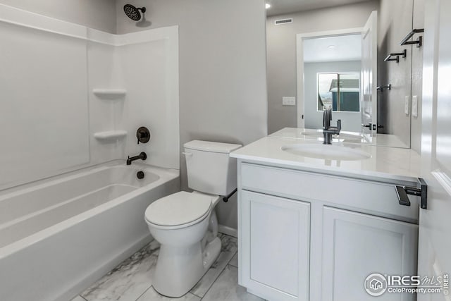 full bathroom featuring toilet, vanity, and bathtub / shower combination