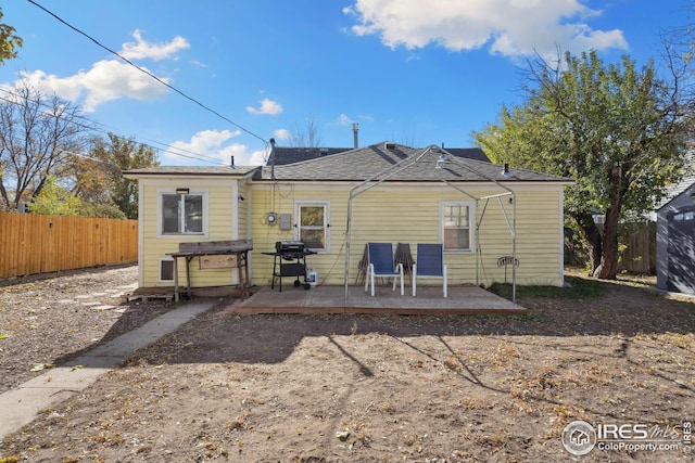 rear view of property with a patio area