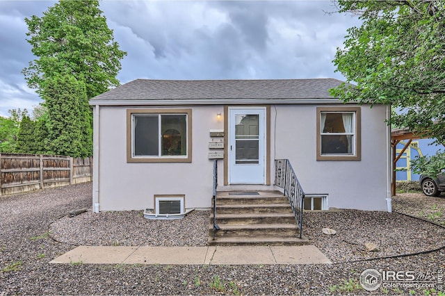 1127 W Mulberry St, Fort Collins, CO 80521 - view of front facade with stucco siding and a shingled roof