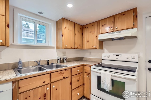 1127 W Mulberry St, Fort Collins, CO 80521 - kitchen featuring electric stove, under cabinet range hood, a sink, light countertops, and recessed lighting