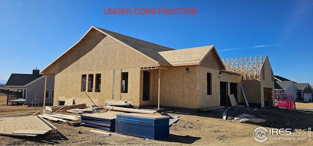 view of side of property with stucco siding