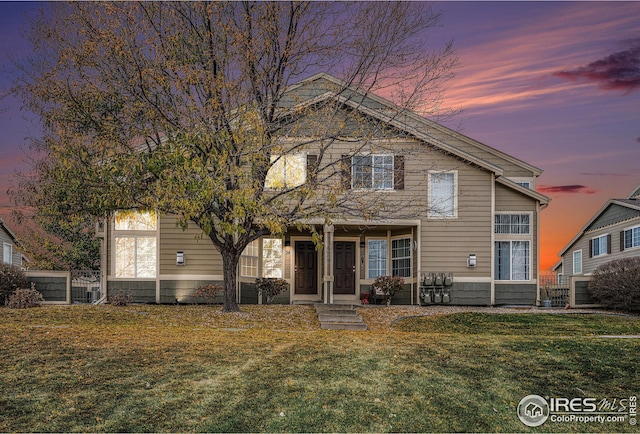 view of front of home featuring a yard