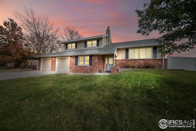 view of front of home with a lawn