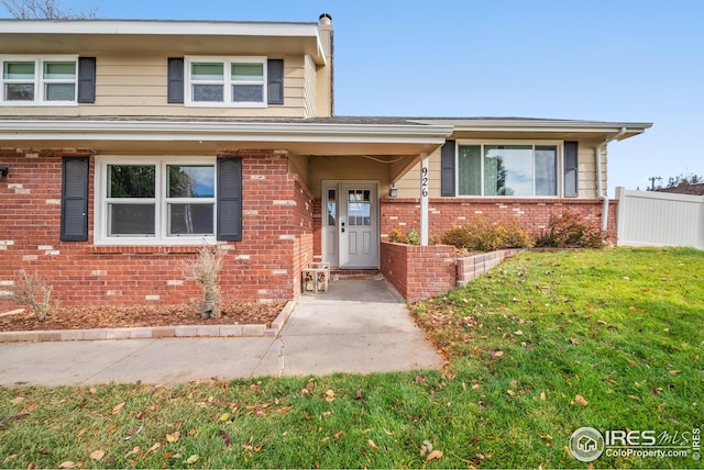 view of front of home with a front yard