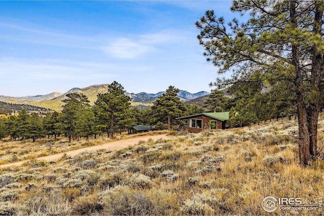 property view of mountains featuring a rural view