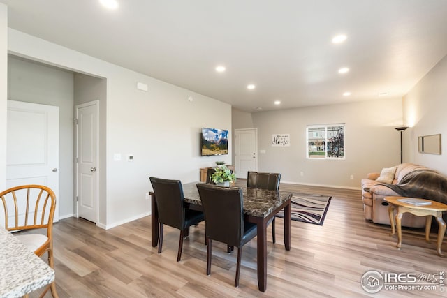 dining area with light wood-type flooring