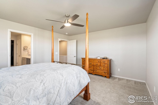 carpeted bedroom with ceiling fan and connected bathroom