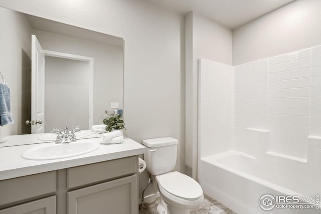 full bathroom with tile patterned flooring, vanity,  shower combination, and toilet