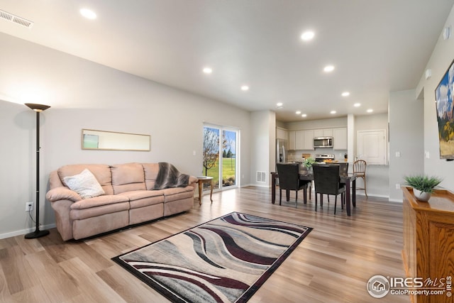 living room with light wood-type flooring