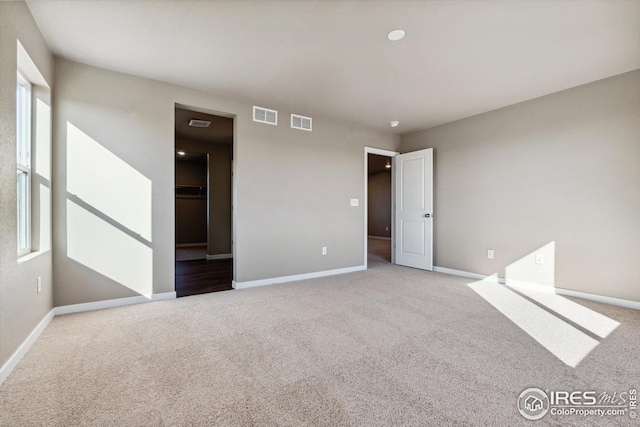 view of carpeted spare room