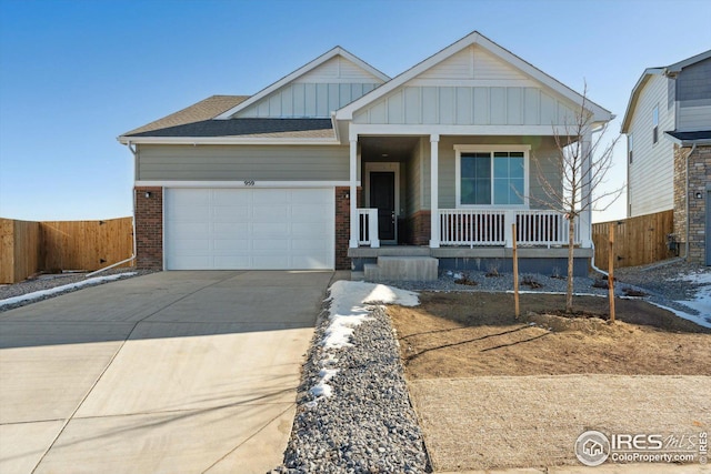 craftsman house featuring a yard and a garage